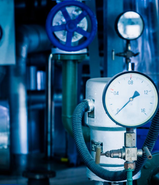 steel pipelines and cables in a plant